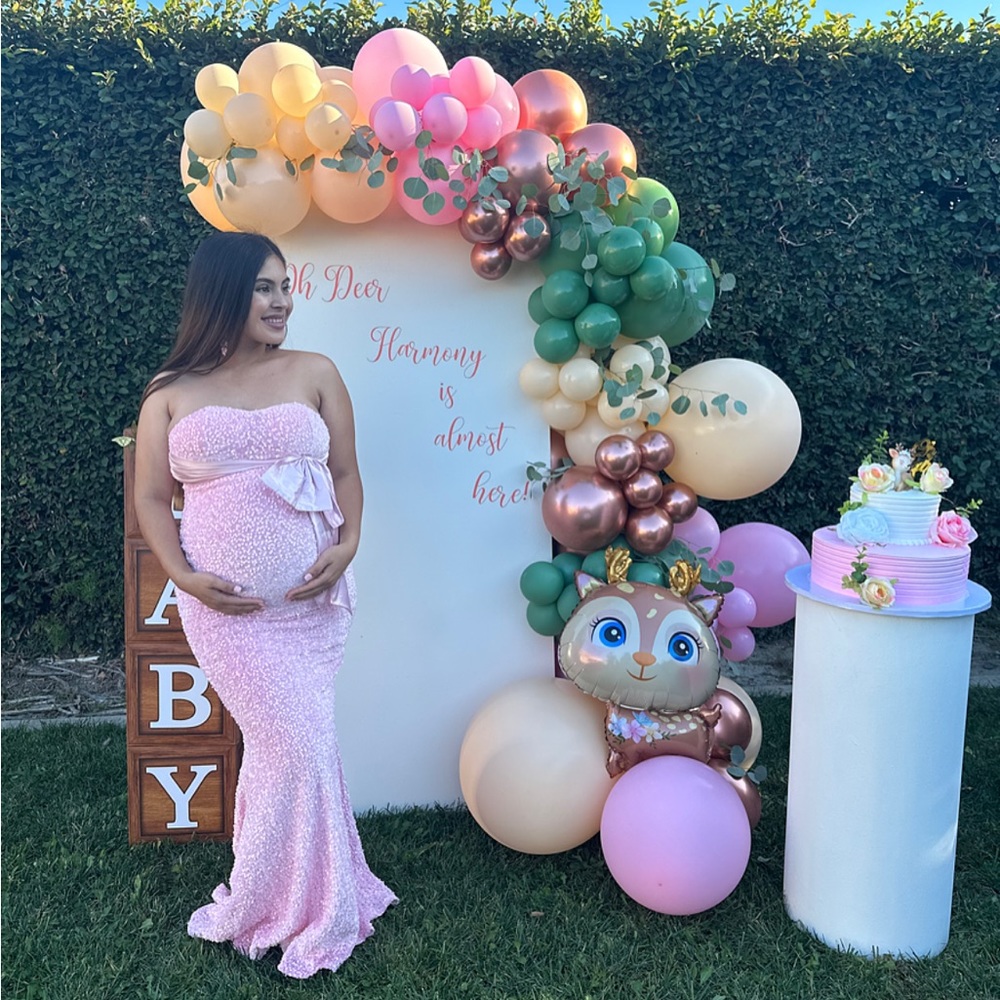 Pink sequin maternity evening gown